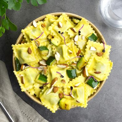 Ravioli ricotta e spinaci con dadolata di zucchine al forno