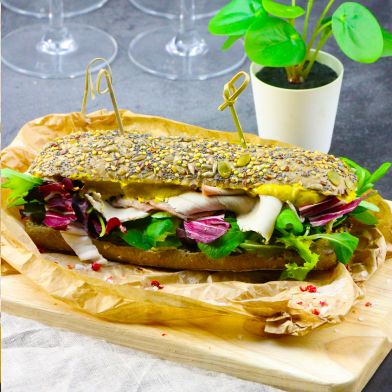 Ciabatta multicereali con porchetta Trevigiana, senape e misticanza