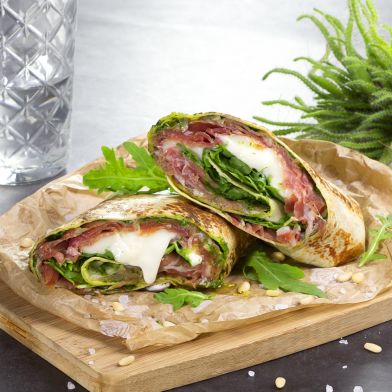 Wrap con crema di rucola, crudo di Parma e stracchino